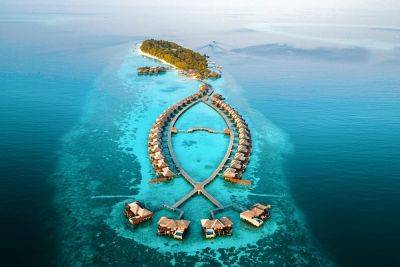Изучите океан на полуподводной лодке: обзор Lily Beach Resort and Spa - piligrimos.com - Мальдивы